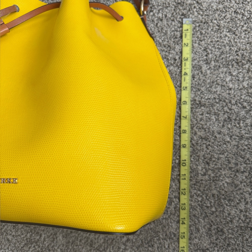 Dooney & Bourke | Vibrant Yellow Leather Sling Backpack + Matching Pouch